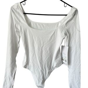 Lululemon Athletica White Fitted Bodysuit Top
